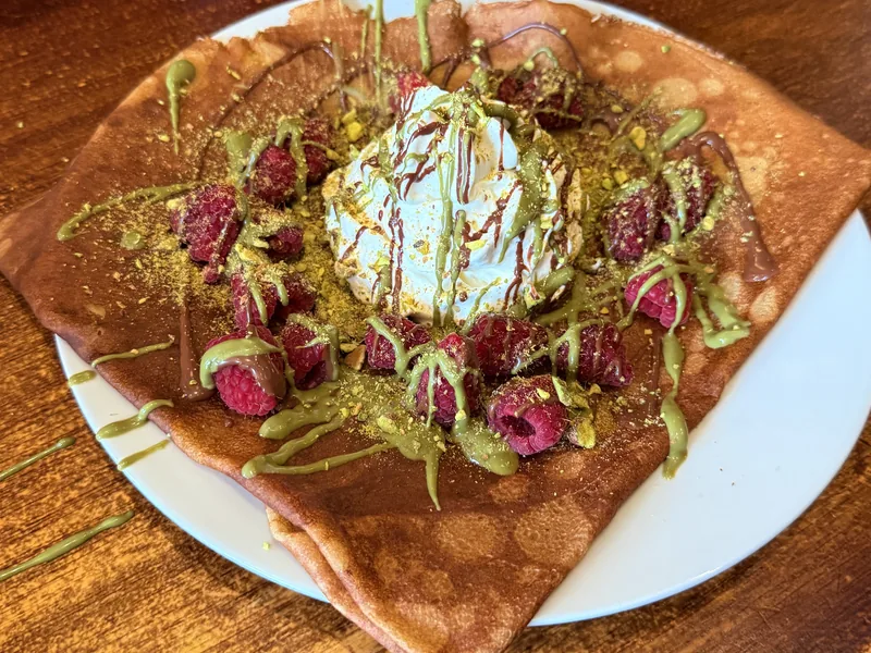 A sweet crêpe with raspberries, pistachio cream and Chantilly at Paris Crêpes Café, Niagara Falls