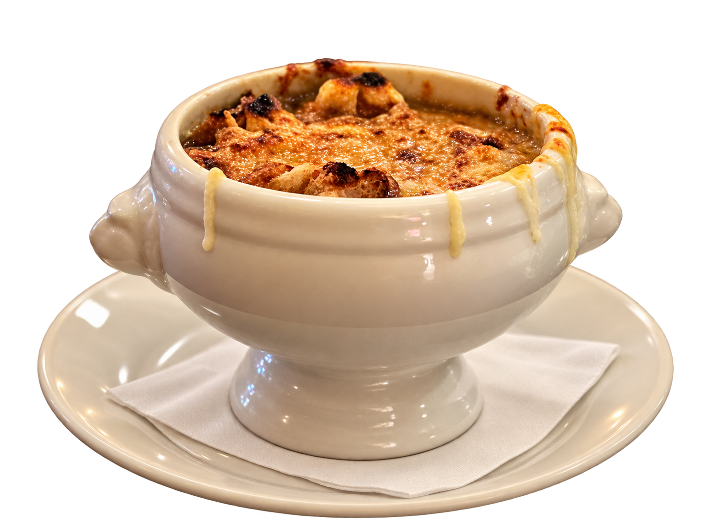 Our white ceramic bowl of French onion soup with golden melted cheese, served on its saucer