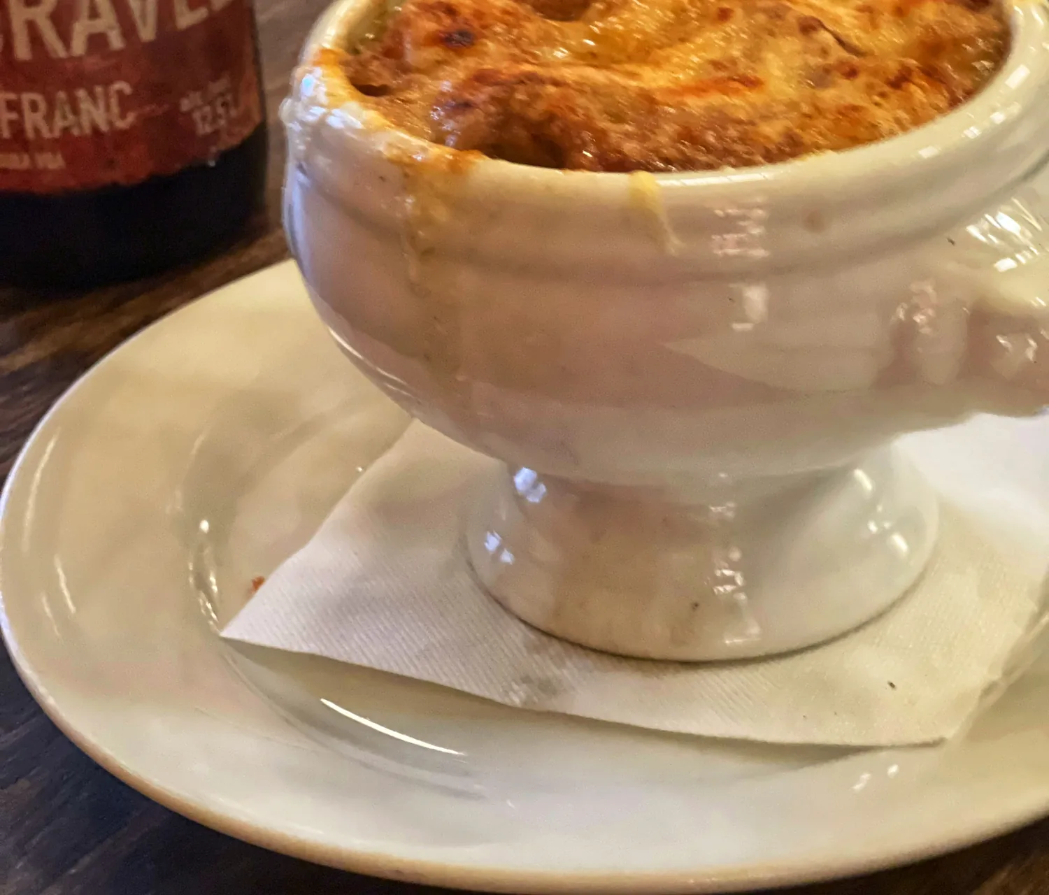Soupe &agrave; l'oignon and a bottle of Niagara red &mdash; half-price wine bottles every Friday at Paris Cr&ecirc;pes Caf&eacute;